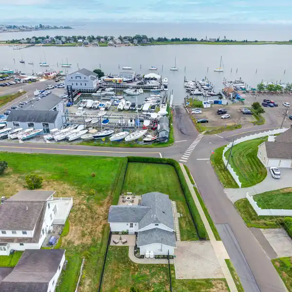 REBUILT BEAUTY STEPS FROM THE SHORELINE