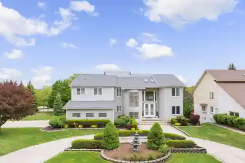 Modern Colonial with Wraparound Deck