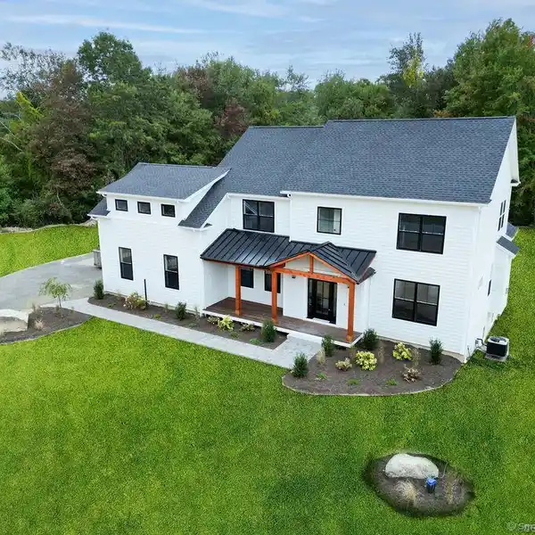 MODERN ELEGANCE MEETS TRANQUILITY IN NEWTOWN