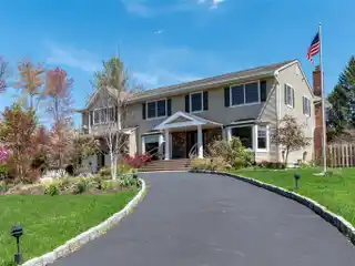 Luxurious and Comfortable Colonial Home on a Serene Acre
