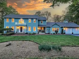Stunning Colonial on Nearly Two Wooded Acres