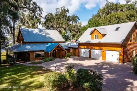 Elegant Riverfront Home on Double Lot