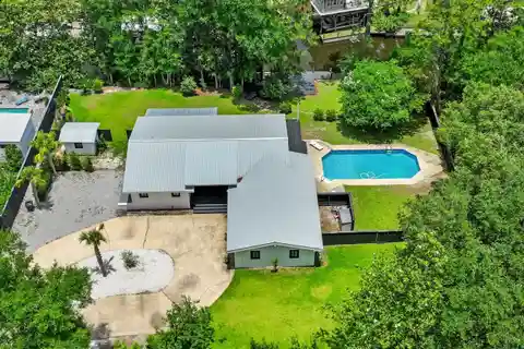 Extraordinary Canal-Front Sanctuary Set on a Rare Double Lot