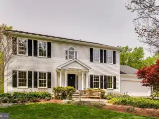 Elegant Colonial Retreat on Tranquil One-acre Lot