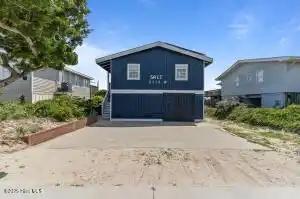 THOUGHTFULLY MAINTAINED CLASSIC BEACH COTTAGE