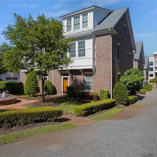 BEAUTIFUL BRICK TOWNHOME IN THE CAVALIER RESIDENCES