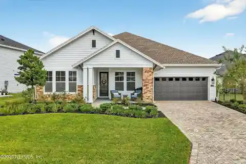 Luxury Living in This Exquisite Waterfront Pool Home