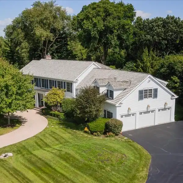 DISTINGUISHED HOME WITH REFINED INTERIORS AND RESORT-STYLE AMENITIES