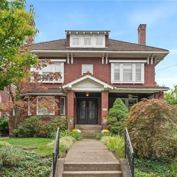 GORGEOUS BRICK CENTER HALL HOME