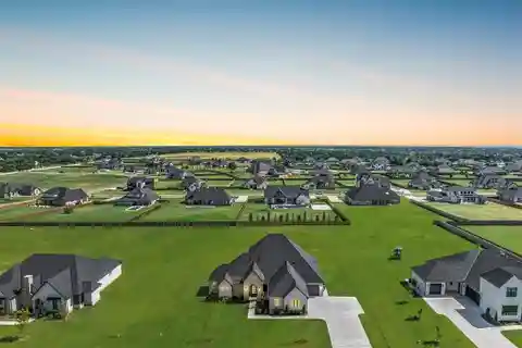 Experience Sophisticated Living in This Gated Addington Farms Retreat