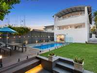 LIGHT-FILLED HOME IN A PERFECT SETTING