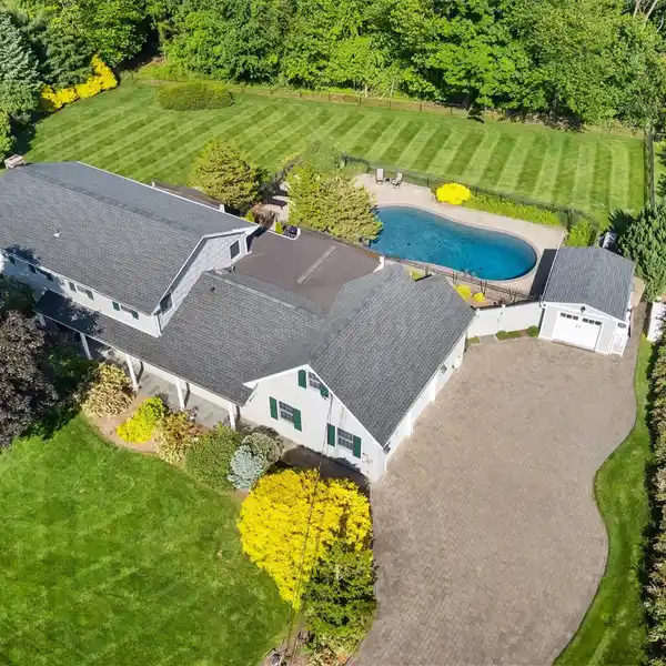 EXPANDED COLONIAL RETREAT WITH DREAM KITCHEN