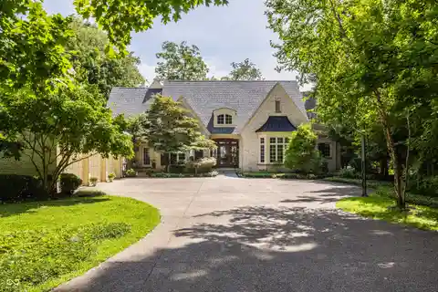French Country-Inspired Residence on 2.8 Wooded Acres
