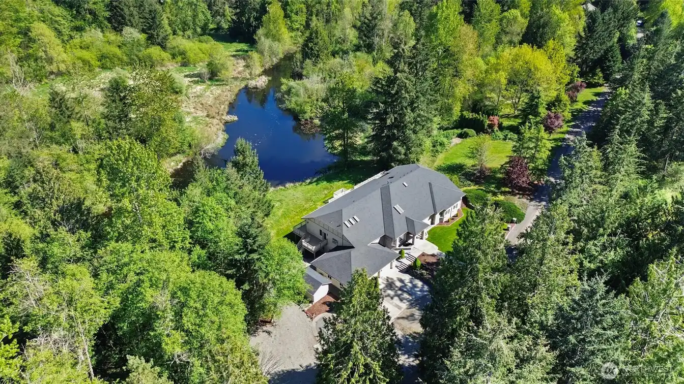 Private Estate on 7.5 Acres with Spring Fed Lake