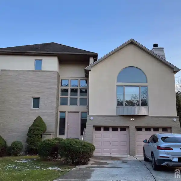 THREE-STORY COLONIAL WITH FLEXIBLE LIVING SPACES