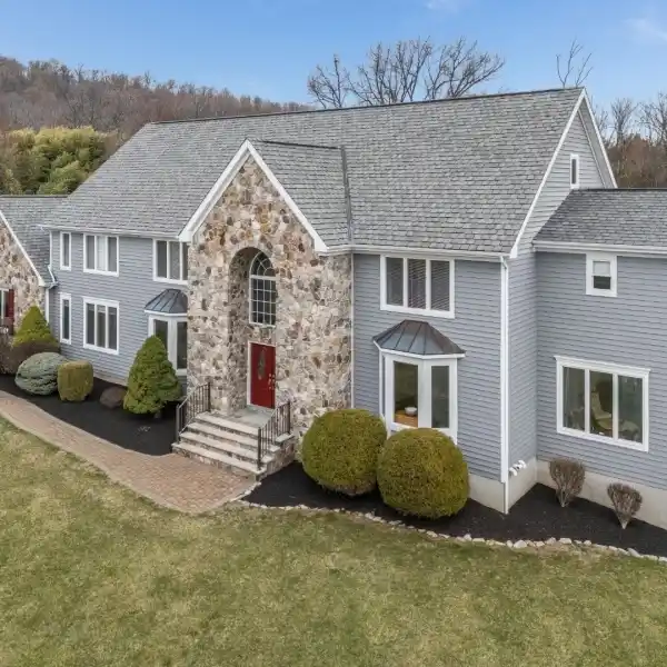 SUPERBLY MAINTAINED STONE-FRONT COLONIAL