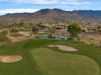HIGHLY UPGRADED HOME WITH SWEEPING GOLF AND MOUNTAIN VIEWS