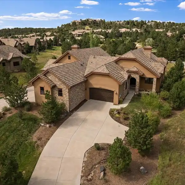LOW-MAINTENANCE LUXURY LIVING IN A COVETED GATED COMMUNITY