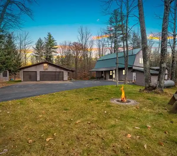 ONE-OF-A-KIND HANDCRAFTED HOME ON 60 WOODED ACRES
