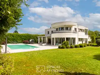 Spacious Home Surrounded by Private Wooded Grounds