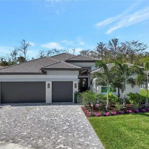 ONE OF THE MOST COVETED HOMES WITHIN VALENCIA TRAILS