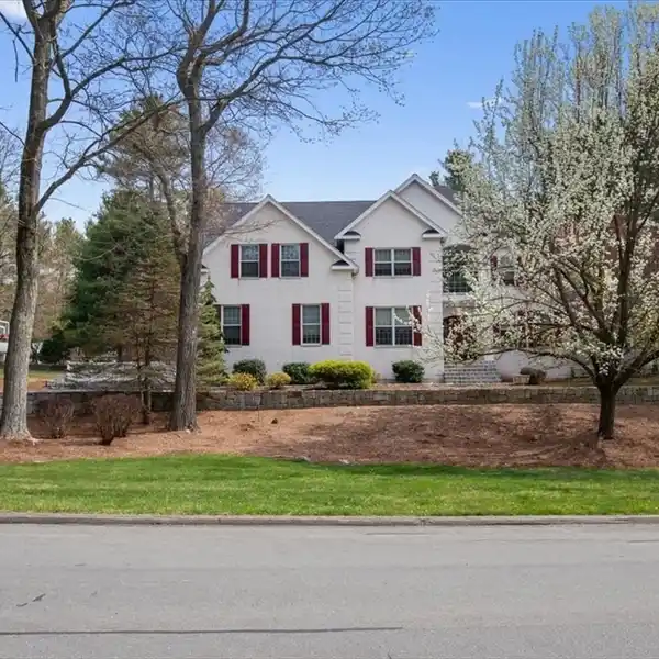 CUSTOM BRICK-FRONT COLONIAL ON A CHARMING CUL-DE-SAC