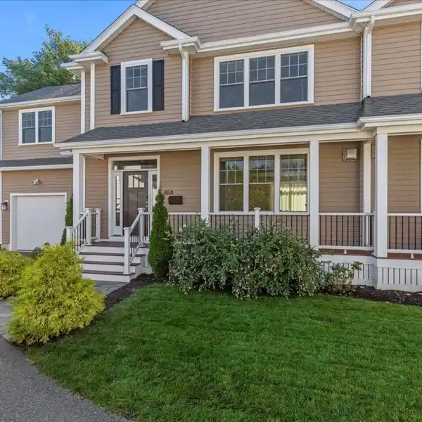 NEARLY NEW AND METICULOUSLY MAINTAINED TOWNHOME