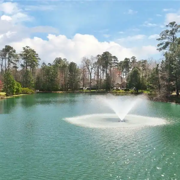 EXQUISITE LAKEFRONT ELEGANCE AND WARMTH
