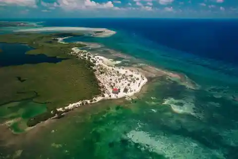 14 Acres with Expansive Beach