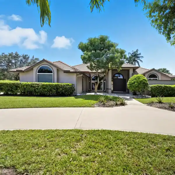 ELEGANT GATED ESTATE WITH VAULTED LIGHT-FILLED INTERIORS