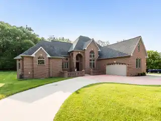Artfully Crafted Estate in Prestigious Upper Glade