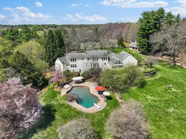 Unique Cape Cod-style Home on 5.47 Acres