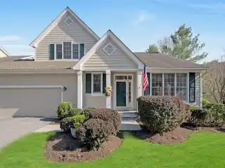 Beautifully Maintained End Unit in the Riverwoods Community