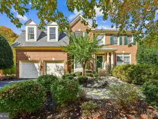 Grand Foyer Elegance Meets Sunlit Sophistication