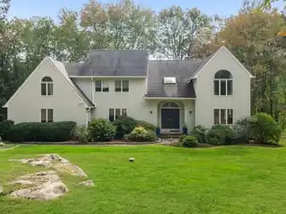Exceptional Home on Six Lush Acres