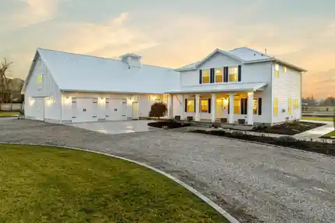 Custom Modern Farmhouse Set on Expansive Acreage