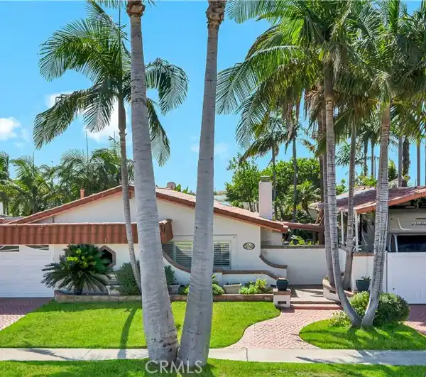 UNIQUE AND HIGHLY UPGRADED SPANISH-STYLE HOME