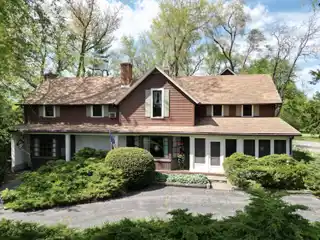 Spacious Home on 110 Acres with Barn and Pond
