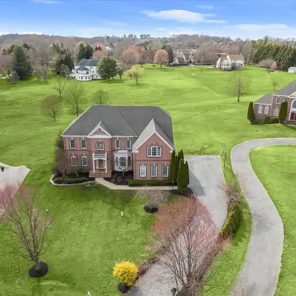 MAJESTIC BRICK COLONIAL WITH GRAND ENTERTAINING SPACES