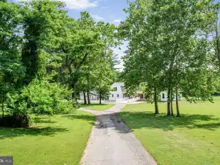 Spacious Home with Great Potential on 7.58 Acres