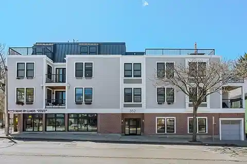 Beautifully Designed Davis Square Two-level Condo