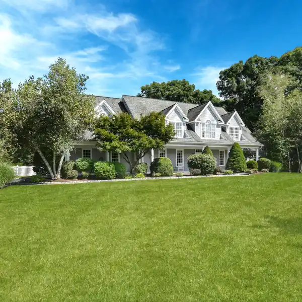 BEAUTIFULLY DESIGNED HOME ON THREE PRIVATE ACRES