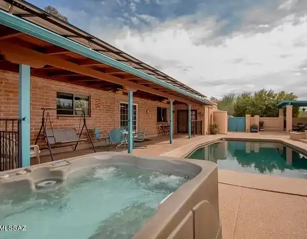 CENTRALLY LOCATED FOUR BEDROOM HOME WITH ATTACHED IN-LAW QUARTERS