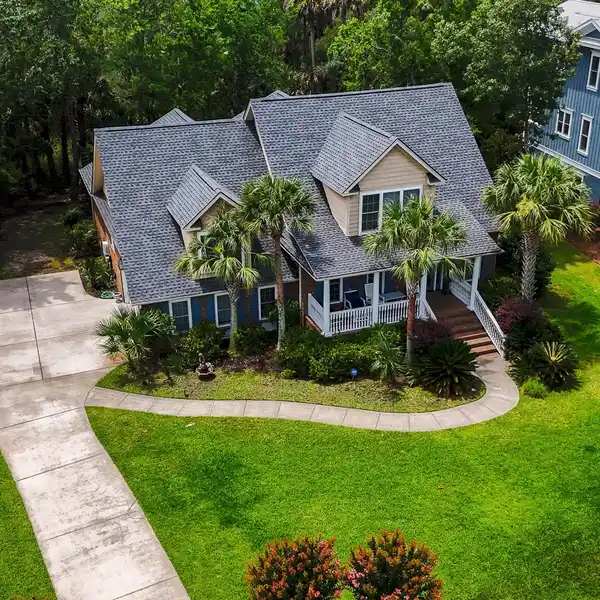 CUSTOM BRICK HOME IN DUNES WEST