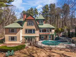 Shingle-Style Home with Carriage Home on over Six Acres