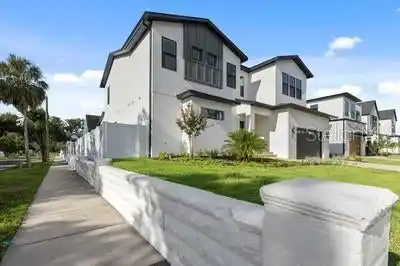 CONTEMPORARY LUXURY ON A PREMIER CORNER LOT