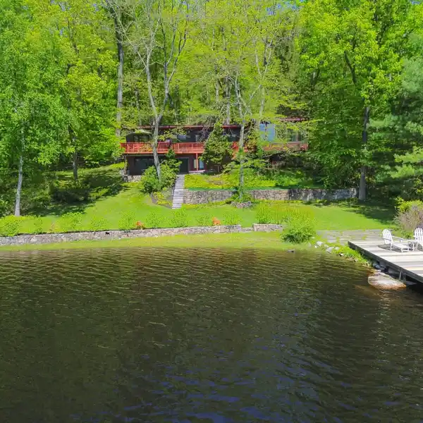 SUN-FILLED RETREAT WITH PRIVATE LAKE ACCESS