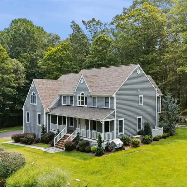WELCOMING COLONIAL HOME ON FOUR PRIVATE ACRES