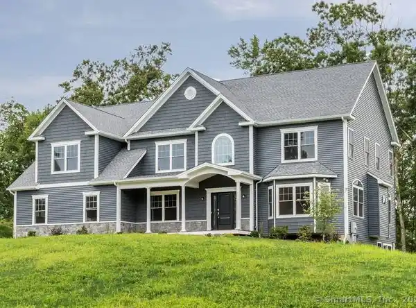 EXQUISITE NEW CONSTRUCTION IN A TRANQUIL SETTING