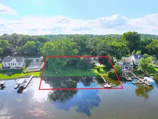 Rare Riverfront Estate with 200’ Frontage